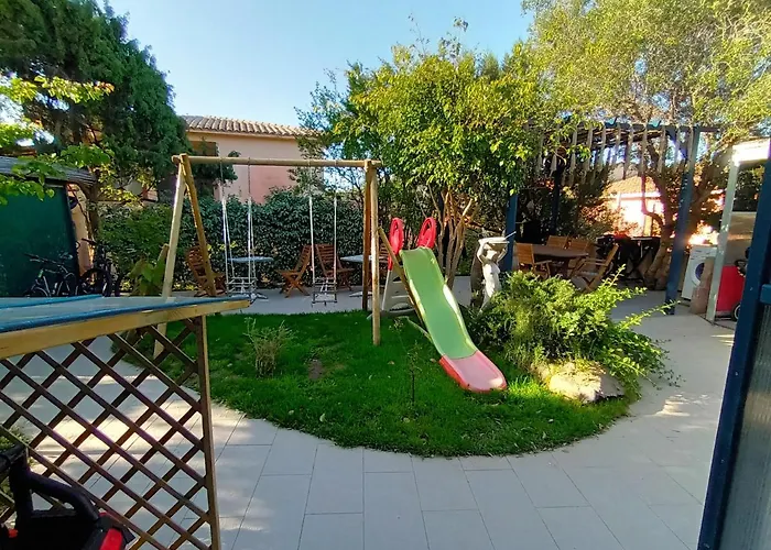 Portopollo Surfhouse 3* Barrabisa