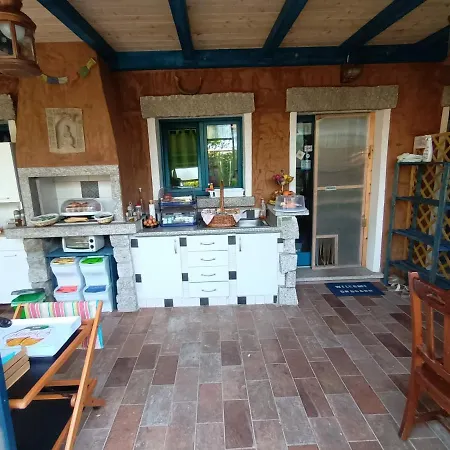 Bed & Breakfast Portopollo Surfhouse Barrabisa