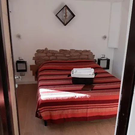 Portopollo Surfhouse Bed and breakfast Barrabisa