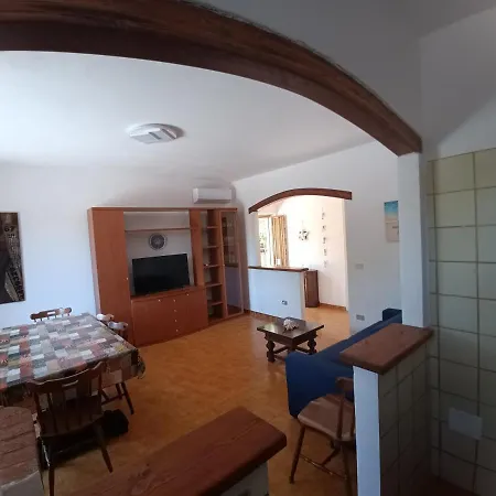 Portopollo Surfhouse 3* Barrabisa