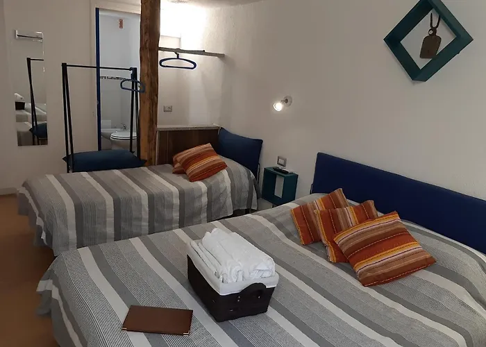 Portopollo Surfhouse Bed & Breakfast Barrabisa